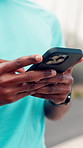 Phone, hands and man outdoor for fitness with texting, communication or chatting on mobile app. Technology, sports and male person with cellphone for online workout, exercise or training in nature.