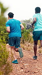 Exercise, men and running challenge on mountain for marathon practice, stamina or cardio workout. Runners, team and jog on nature trail for physical endurance, sports performance and intense fitness