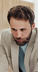 Businessman, discussion and meeting with proposal in office for company strategy, ideas or planning. Man, employee or talking with schedule agenda for brainstorming tasks, project or development