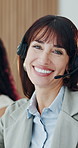 Happy woman, face and consultant with headset in call center for customer service or enquiry.  Portrait, female person or friendly agent with smile, mic or team for virtual asssistance or help agency