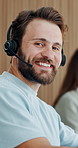 Happy man, face and consultant with headset for customer service or enquiry in call center. Portrait, male person or friendly agent with smile, mic or team for virtual asssistance or help agency