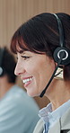 Call center, headset and woman in office, talking and communication for consultation. Mature person, crm and employee in workplace, conversation and feedback for customer support, smile and help desk