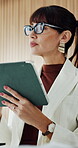 Woman, thinking and research in office with tablet, idea or story development for online journalism. Mature person, glasses and reflection in workplace with tech, news investigation and plan article.