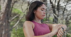 Check, smart watch and woman in nature, fitness and training stats on app, breathing and exhaustion. Outdoor, athlete and person with tech for exercise results, tired and monitoring heart rate on web