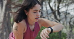 Fitness, watch and wind with woman in nature for adventure, hiking hobby or running fatigue. Breathing, exercise and time with hiker person outdoor in mountain for recovery, rest or tracking progress