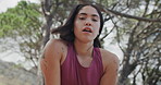 Face, tired and woman in forest, fitness for health benefits and challenge for trekking. Nature, person or hiker in woods, burnout and rest for training, endurance and exhausted with fatigue or break