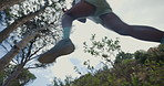 Sneakers, hiking and man with journey, low angle and fitness for health benefits, steps and exercise. Nature, hiker or person with shoes, cardio workout or trekking for wellness, holiday or adventure
