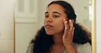 Skincare, mirror and woman checking face for marks, blemishes or pimples in bathroom at home. Hydration, glass reflection and female person with glow for beauty, cosmetics or health in apartment.