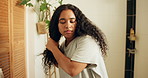 Haircare, girl and natural treatment in bathroom for frizz control, damage repair or getting ready. Grooming, african woman and deep conditioning in home for curls texture, hair routine or cosmetics