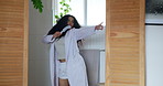 Happy woman, dancing and singing with brush in robe for good morning or spa day in home. Excited, female person or enjoying vibe with energy in bathroom for grooming routine or fresh start in house