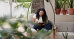 Diary, notebook and woman on hanging chair outdoor with agenda, feelings or emotions with writing. Mental health, relax and female person with journal with to do list, personal growth or self care. 