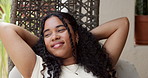 Thinking, woman and relax in hanging chair in front yard for chill weekend, comfort and calm morning. Home, african girl and stretch on patio seat for rest, self reflection and peaceful satisfaction