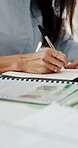 Writing, documents and hands of businessman in office with research for finance report with budget. Planning, paperwork and male financial manager with diary for investment proposal in workplace.