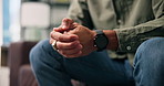 Anxiety, hands and man in home with stress, overthinking or mistake with wrong decision in lounge. Sofa, coping mechanism and nervous person with worry, trauma or stimming for mental health crisis