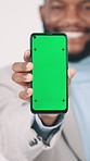 Happy, black man and hand with phone screen in studio for marketing on a white background. Portrait, businessman or African user with smile, mobile smartphone display or chromakey for advertising app