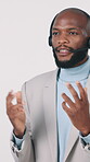 Talking, agent and man with headset in studio, telemarketing or communication with contact for sales. White background, consultant and black person with mic for discussion, lead generation and chat