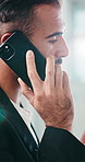 Talking, negotiation and businessman with phone call in office, potential client and agreement terms. Lens flare, contract discussion and broker with details for compensation fees, contact and mobile