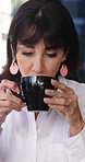 Woman, coffee and thinking with drink in cafe for inspiration, break or caffeine beverage. Thoughtful, female person or customer contemplating with smile or mug to start day or energy in restaurant
