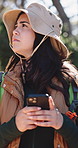 Smartphone, hiking and woman in forest, lost and app for direction, internet and confused. Digital map glitch, hiker and person in woods, explore or cellphone for location, network problem or journey