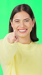 Face, green screen or woman with happiness, pointing to you or accountability on studio background. Decision, opportunity or person with hand gesture for support, announcement or choice for selection