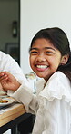 Lunch, happy and face with child and family outdoor for bonding, eating and connection. Holiday celebration, healthy food and love with people in backyard of home for care, smile and dining table