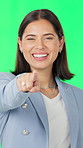Business, face and pointing with woman on green screen for choice, vote or we are hiring campaign. Decision, selection and smile of happy employee isolated in studio for onboarding or recruitment