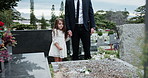 Support, dad and girl at gravestone with flower, remembrance and parent comfort in mourning. Emotional, man and child in cemetery with rose, family tribute and shared grief with memorial visit.
