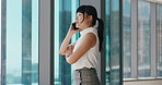 Woman, phone call and smile in office by window, insight and review proposal at real estate company. Person, smartphone and realtor with conversation, happy or listen for feedback at property agency