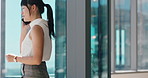Woman, phone call and discussion in office by window, insight and proposal at real estate company. Person, smartphone and realtor with conversation, walk and listen for feedback at property agency