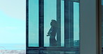 Window, thinking and woman with arms crossed in office, economic growth and financial security idea. Reflection, space and company manager with plan for capital generation, problem solving and view