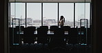 Phone call, talking and business woman by window for communication, negotiation and investment deal. Corporate, office and person on smartphone for financial advisor, contact and client update
