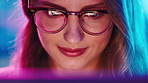 Woman, neon and glasses with laptop for entertainment, online subscription or gaming in home. Female person, gamer or smile with screen reflection for esport, user interaction or network in house