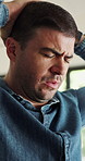 Stress, headache and man in home, pain and overwhelmed for mistake, panic attack and pressure. Facial expression, tension or person in lounge, migraine and dizzy with brain fog, frustrated or failure
