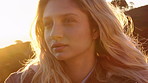 Woman, thinking and sunshine in nature with peace, remember memory and contemplation for holiday. Female person, relax and reflection outdoor with nostalgia, sightseeing and vision for vacation trip.
