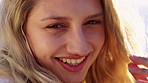 Face, funny and woman in nature for vacation, smile and calm on weekend break at retreat. Laughing, happiness and person rest outdoor in countryside for chill, tourism trip and holiday in Germany