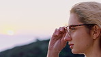 Glasses, hiking and profile of woman in nature for calm breathing, fresh air or travel hobby. Adventure, relax and sightseeing with hiker person outdoor for health, peace or wellness activity