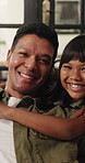 Face, hug and child with dad on sofa for connection, relationship and bonding for family weekend. Home, happy and portrait of father with girl in embrace for affection, support and trust together