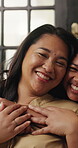 Hug, happy and face of mother and daughter in family home for bonding, connection and love. Smile, weekend break and support with woman and child in living room of apartment for care and comfort