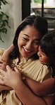 Hug, happy and relax with mother and daughter in family home for bonding, connection and love. Smile, weekend break and support with woman and child in living room of apartment for care and comfort