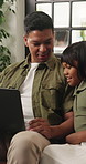 Laptop, smile and relax with father and girl on sofa for streaming service, movie choice and education show. Film subscription, bonding and online kids series with man and daughter in family home