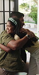 Happy, father or child with hug at front door for welcome home, greeting or return from business trip. Love, dad and embrace girl kid in apartment for bonding, work arrival and affection for reunion