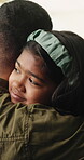 Hug, comfort and child with dad in home for love, relationship and bonding for family connection. Parenting, happy and father with girl in embrace for affection, support and security in living room