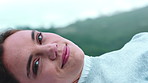 Face, relax and happy woman in nature for holiday, peace and calm on weekend break at retreat. Smile, portrait and person rest outdoor in countryside for chill, tourism and vacation in Germany