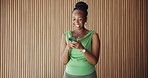 Phone, happy and black woman in office with texting, social media or chatting on mobile app. Technology, smile and African female person with cellphone for typing email, communication or contact.