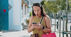 Phone, shopping and surprise with woman in city for notification of deal, discount or sale. App, jumping and wow with excited person outdoor on sidewalk for alert, commercial or retail bargain