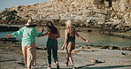 Harbor, skip and walking with woman friends by ocean together for bonding, travel or vacation. Back, energy and holiday with group of people outdoor by sea for adventure, journey or sightseeing