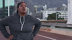 City, fitness and woman with earphones, breathing and thinking of body goals on break and plus size. Streaming, music and African person with burnout on road, reflection and exercise for weight loss