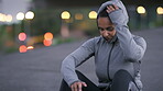City, fitness and woman on break, tired and thinking of body goals after workout, relax and wellness. Outdoor, runner and person with hoodie on street, reflection and exercise recovery or fatigue