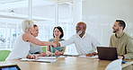 People, smile and meeting in office with handshake, laptop and approval for digital marketing project. Happy, team and shaking hands in agency for creative collaboration, cooperation and advertising.