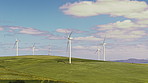Drone, wind turbine and renewable energy for sustainability,  field and landscape with solution. Outdoor, nature and ecology for power, empty and countryside for carbon footprint, view and windfarm